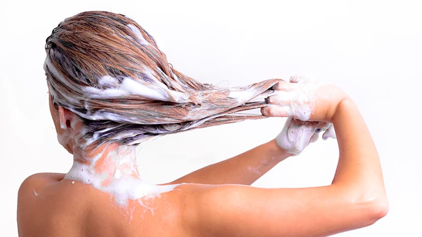 Woman washing her hair